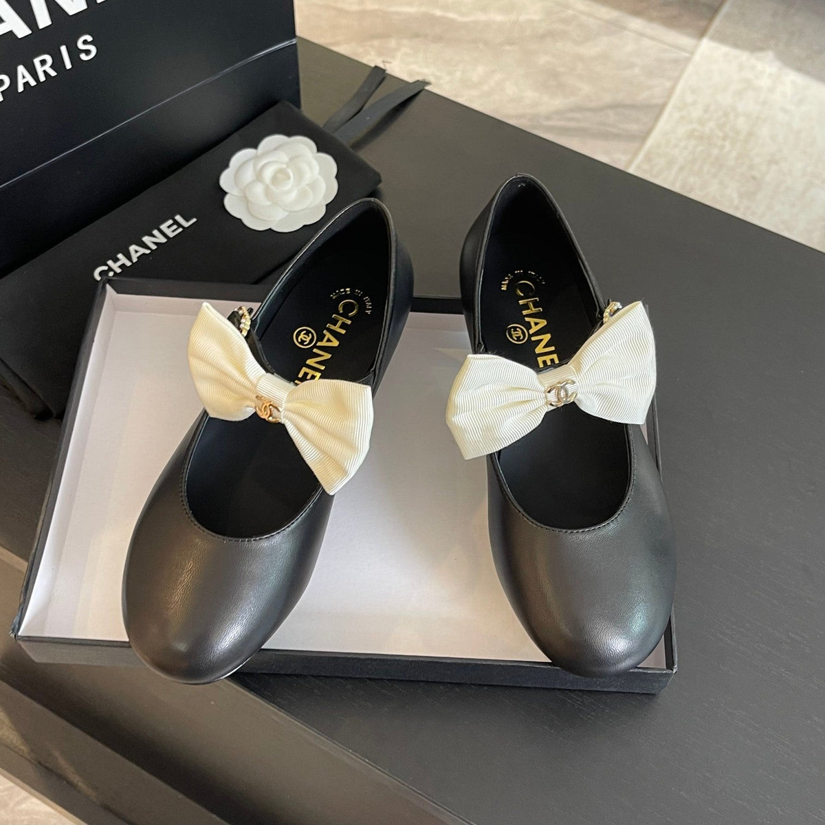 CHANEL BALLET FLAT BLACK LAMBSKIN WITH WHITE BOW